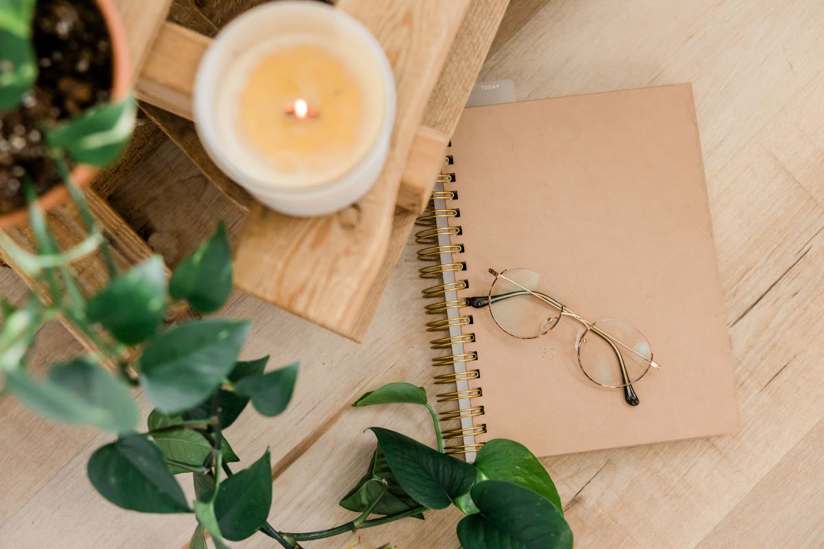 Candle flatlay for rest and relaxation